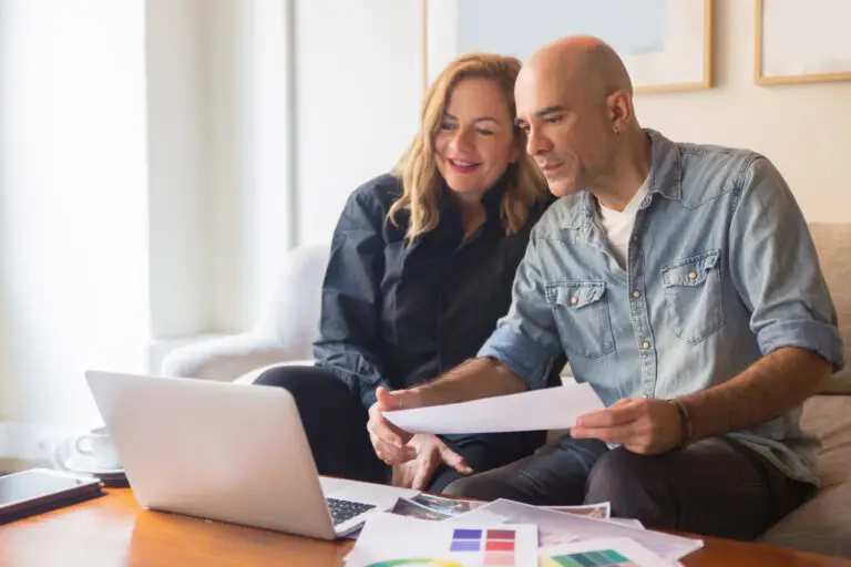 Middle-aged American couple learning about the key components of financial planning