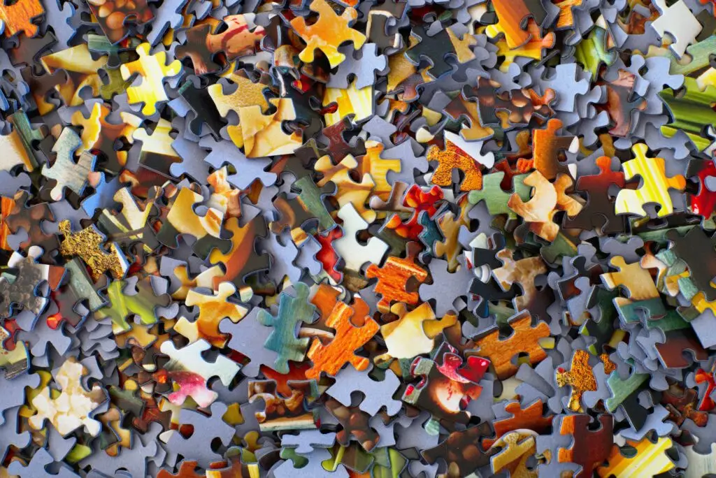 Puzzle pieces used to represent the way research brings everything together in investment consulting