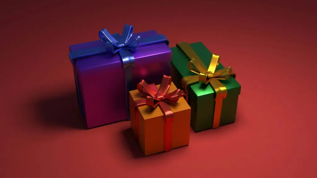 Wrapped presents with bows to represent the importance of your birthday for financial planning during annual financial review meetings.