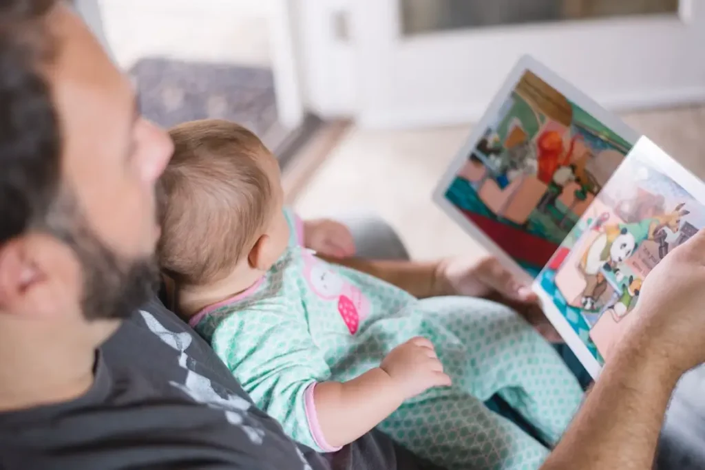 This new dad feels confident because he is investing in his daughter in more ways than one including reading to her and working on opening an investment account for minors.