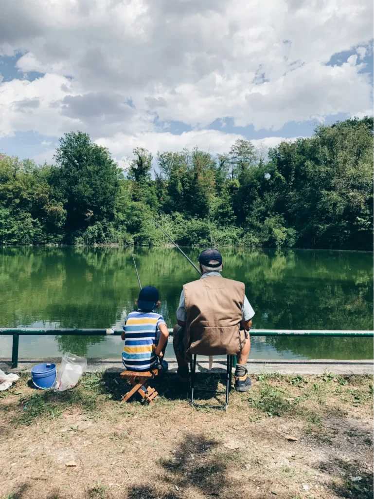 Retired pilot fishing with his grandson, illustrating what life after building aviation retirement strategies looks like.
